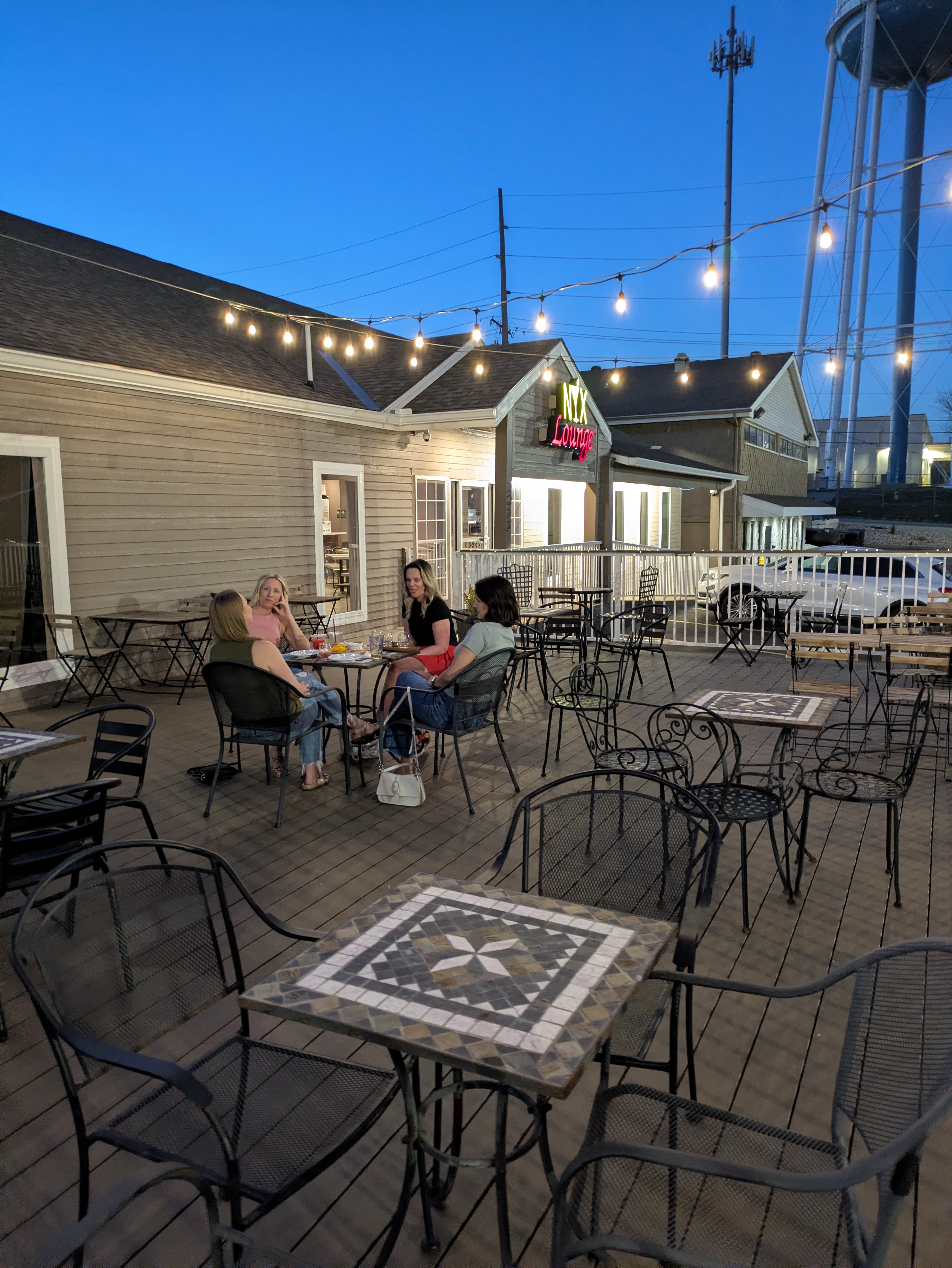 Guests on the NYX Lounge patio