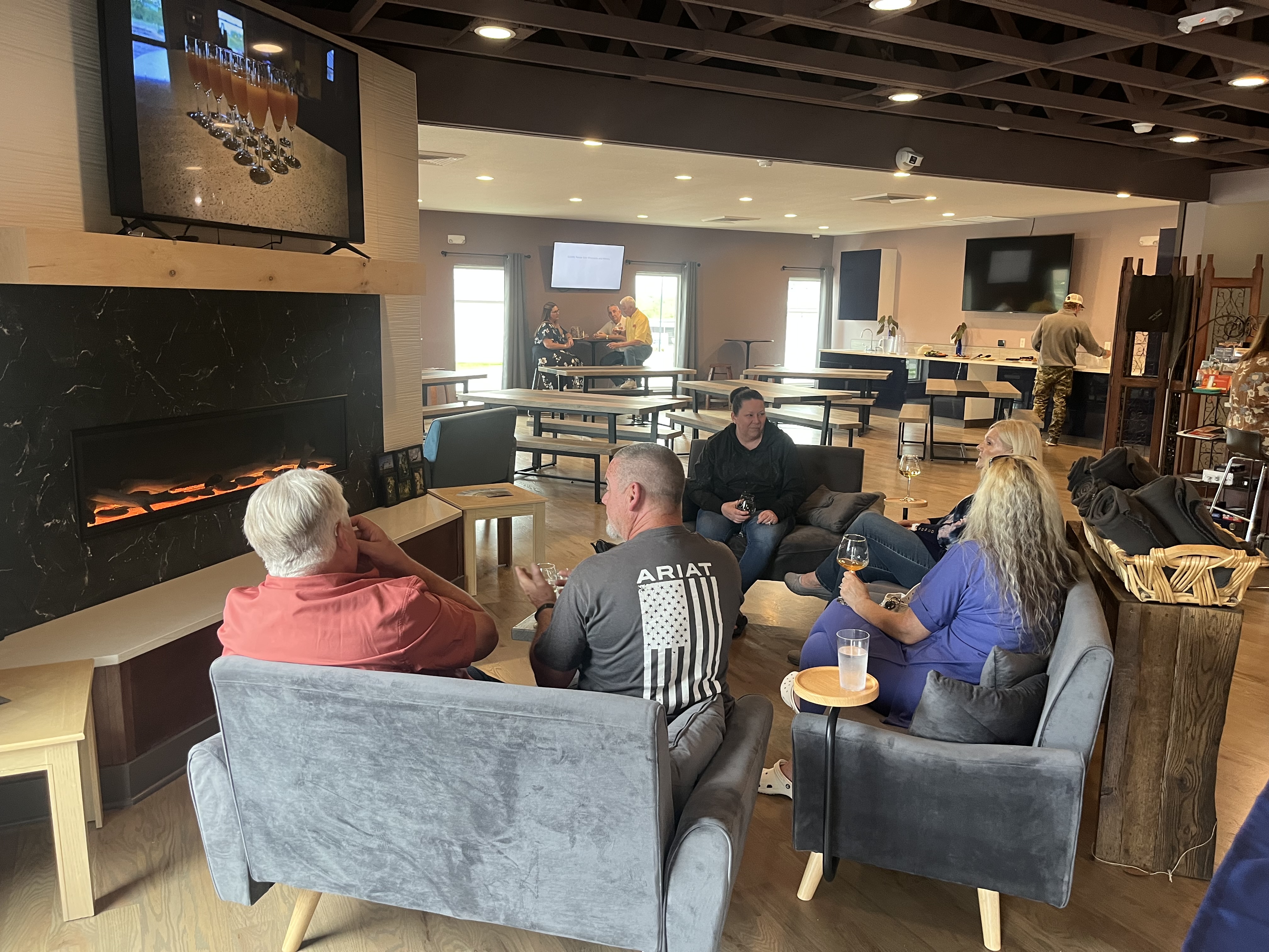 The cozy fireplace seating area at NYX Spirits and Lounge in Gladstone — a welcoming lounge for a regular weekly stop